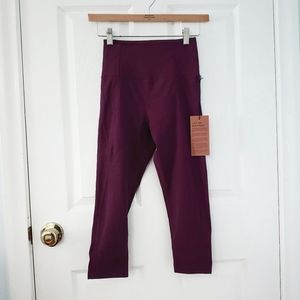 [nwt] girlfriend collective cropped plum compressive high rise leggings